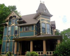 A Victorian house in the Stick style - Click on this icon to go to the House Styles main page The A.E. Stockwell house
