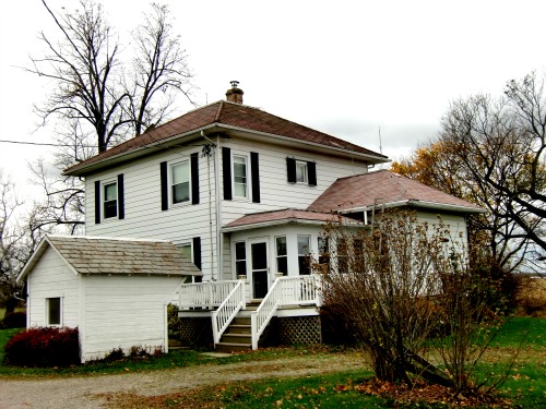 DIY Roofing - My house after replacing the roofs on the kitchen and the porch.