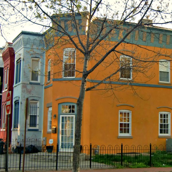 Orangish-Yellow townhouse in DC.