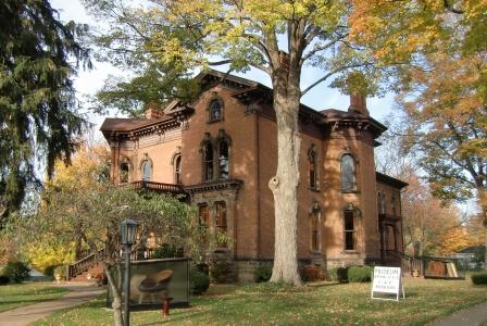 Note the paired windows and the angled bay windows in this Brick Italianate in  Jonesville, MI