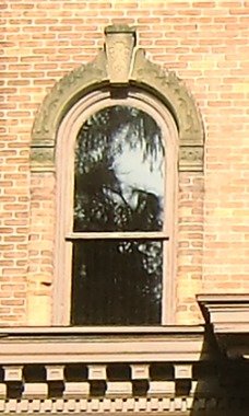 Arches of window at Grovesnor House in Jonesville, Michigan