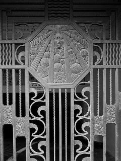 A photo from the Library of Congress's collection.  A gate at the WP Story building in LA