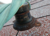Lightning Rod Strap and Insulator - The anchor plates were rusted.  This one is still useable