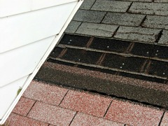 Roof Repair - midway up.  I cut the tabs off as I worked my way up the roof.