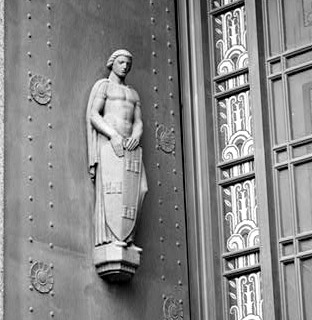 A statue representing Security guards the Davidson County Courthouse, an Art Deco building