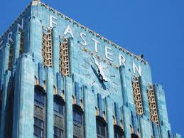 A blue building stands out in a city of grey. Art Deco Architecture could be bold in its use of color.