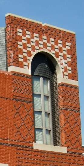 A colorful home with polychromatic brickwork