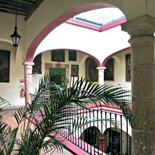 The upper story of the Casa de La Zacatecana shows how the rooms of the house opened up onto a colonnaded corridor surrounding the open courtyard, a traditional feature of Mexican House Design.