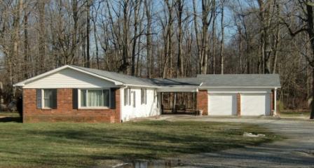 A low roof pitch makes this house seem cheap.