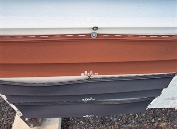 How to Paint Vinyl Siding a Darker Color 