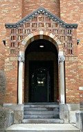 An arched doorway over an entrance to the St. Thomas Parish School in Ann Arbor, MI