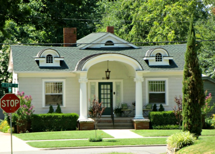 Dummy dormer windows help make this house interesting