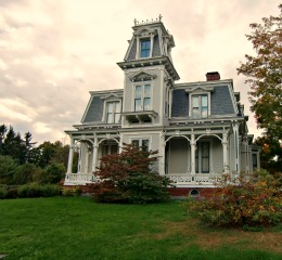 Second Empire house in Bangor, Maine, with a front porch that provides some setback, so the mansard roof is not as dominating.