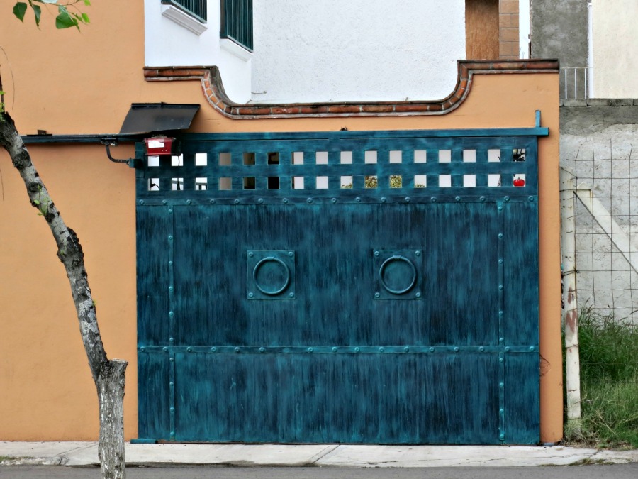 A lot of Mexican homes have gates that look they are capable of repelling an invading army. Like this one, many are also artfully made.