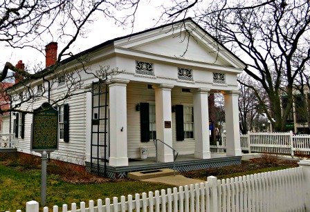 The Kempf House has cast iron grilles embedded into the entablature. This Greek Revival style house is on the edge of downtown Ann Arbor, MI.