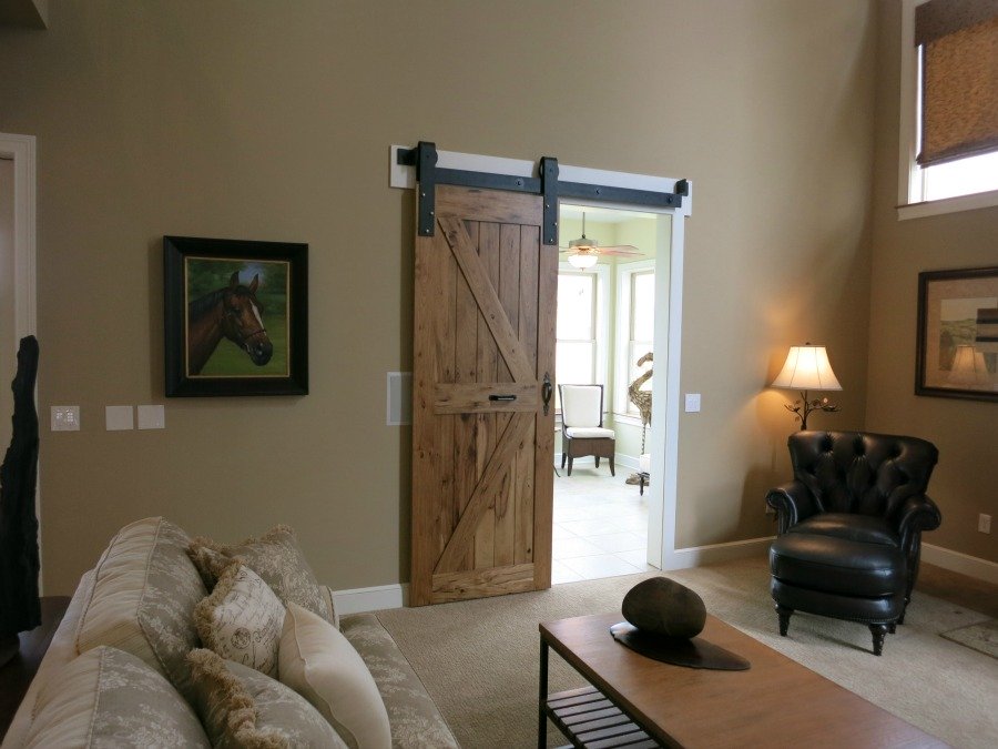 Sliding Barn Door to Sun Room in Prism's Neo-Georgian Home