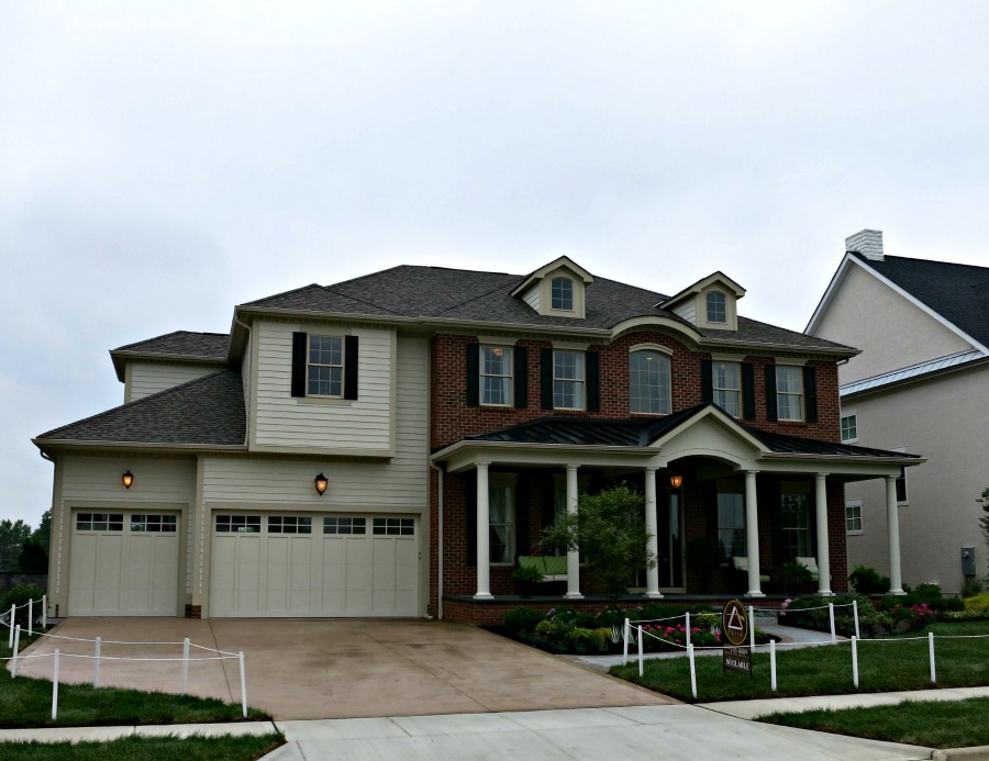 From this angle the garage is still in your face in this Neo-Georgian home at the 2013 Parade of Homes