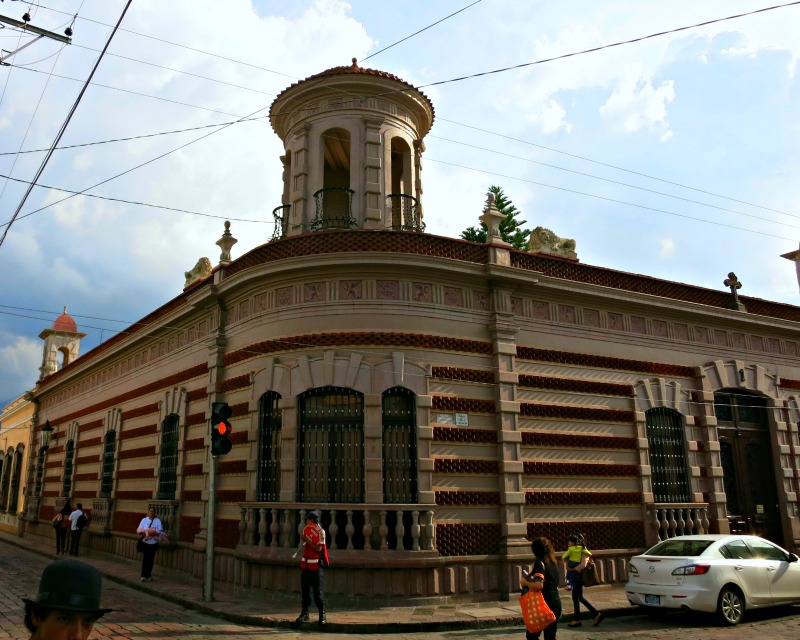 This one is unusual, thanks to its tower and the strong horizontal pattern of its brickwork.