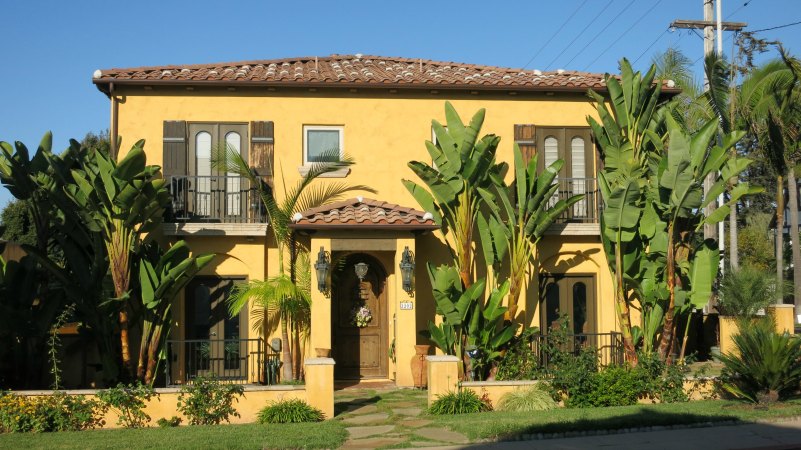 A warm yellow fits the Mediterranean nature of this San Diego house.
