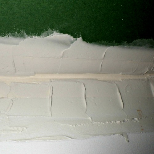 Drywall tape with mud being applied over it