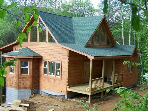 Modern log home with squared logs