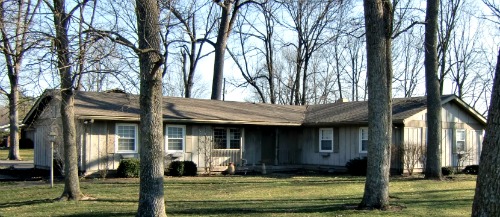 Any house looks better in the woods - Ranch Style Home Designs