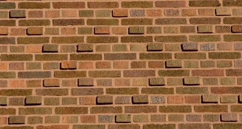 Brick diaper pattern formed by raised bricks
