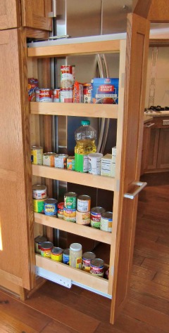 This Kraftmaid spice rack can be accessed from either side